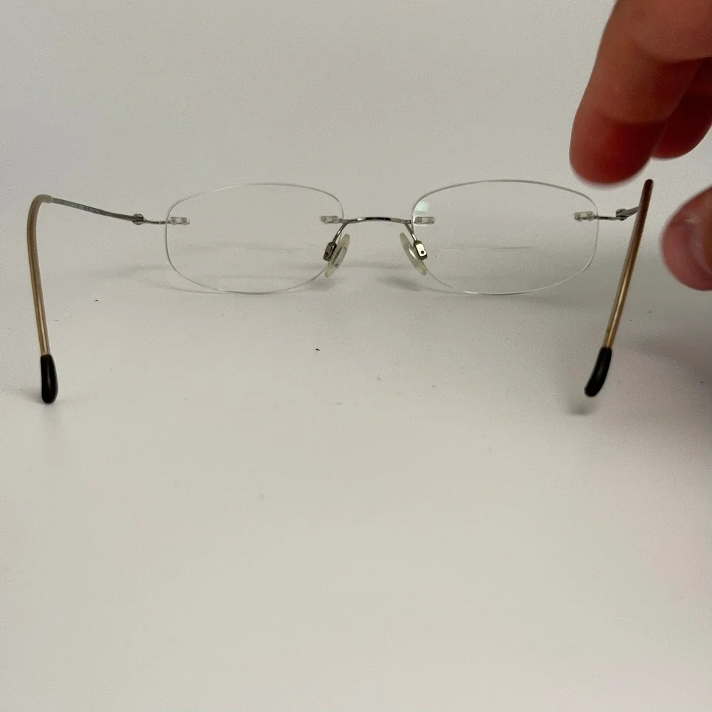 Charmant CH8600 Silver Beta Titanium Rimless Eyeglass Frames 49-19-140mm